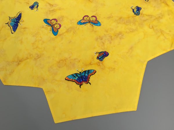 Tischdecke gelb mit vielen Schmetterlingen